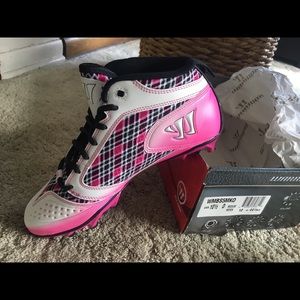 Warrior cleats brand new size 10.5